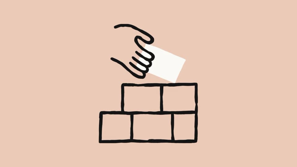 Anthropic illustration of a hand placing a white card onto stacked blocks.