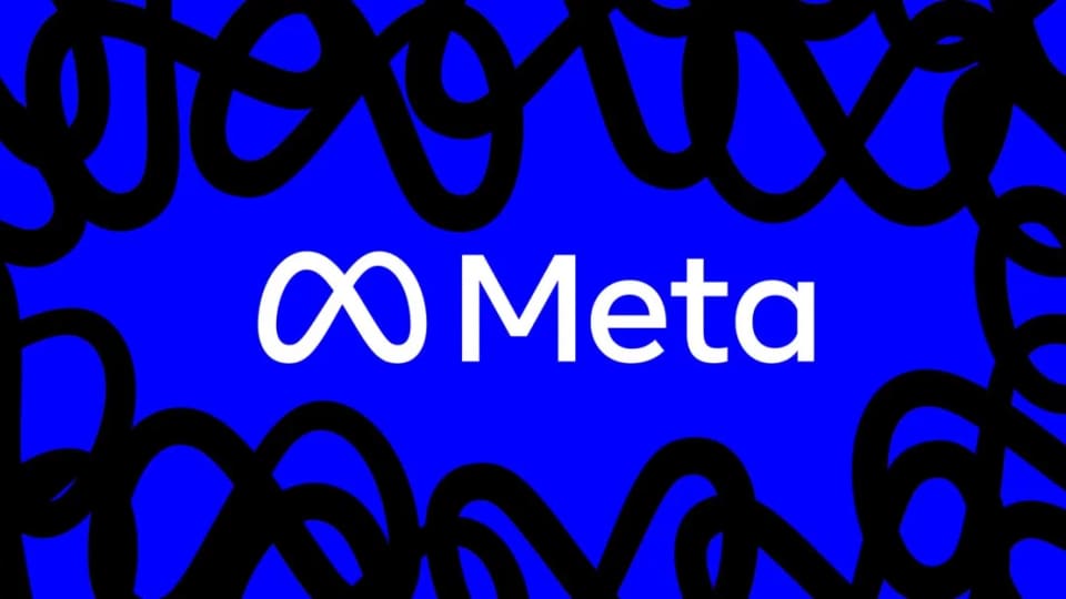 Meta wordmark on a blue background with black looping shapes.