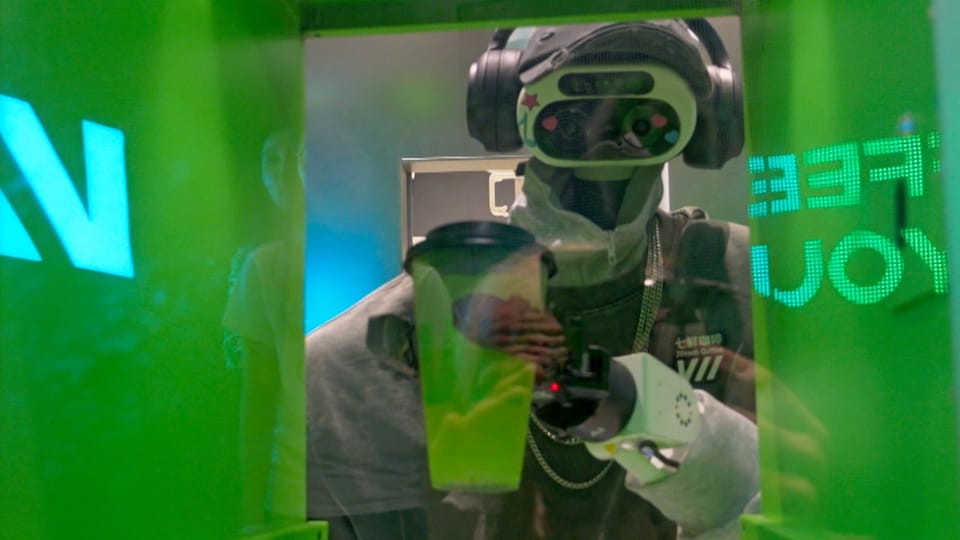 Beijing Coffee Shop Serves Robot-Made Drinks and Features AI Tokens